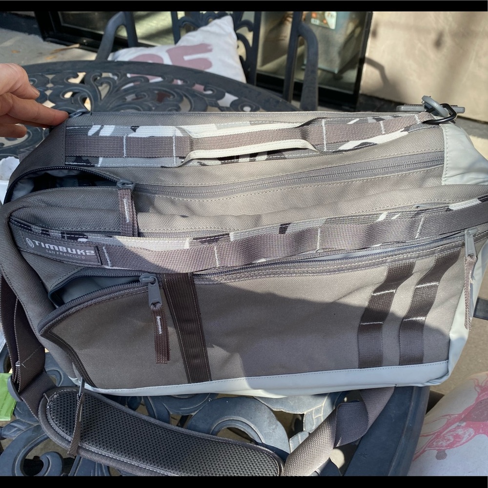 Timbuk2 light gray crossbody and backpack